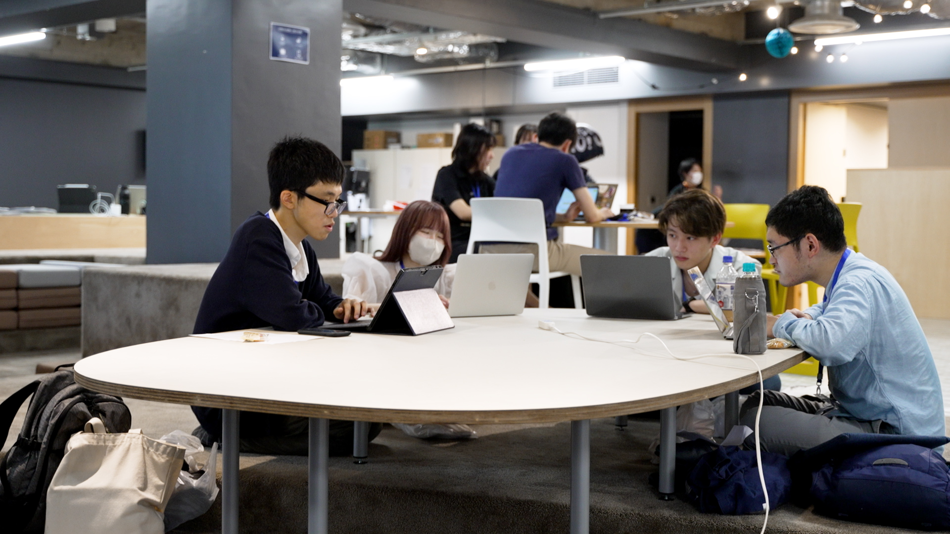Participants engaged in a hackathon. Group discussion.