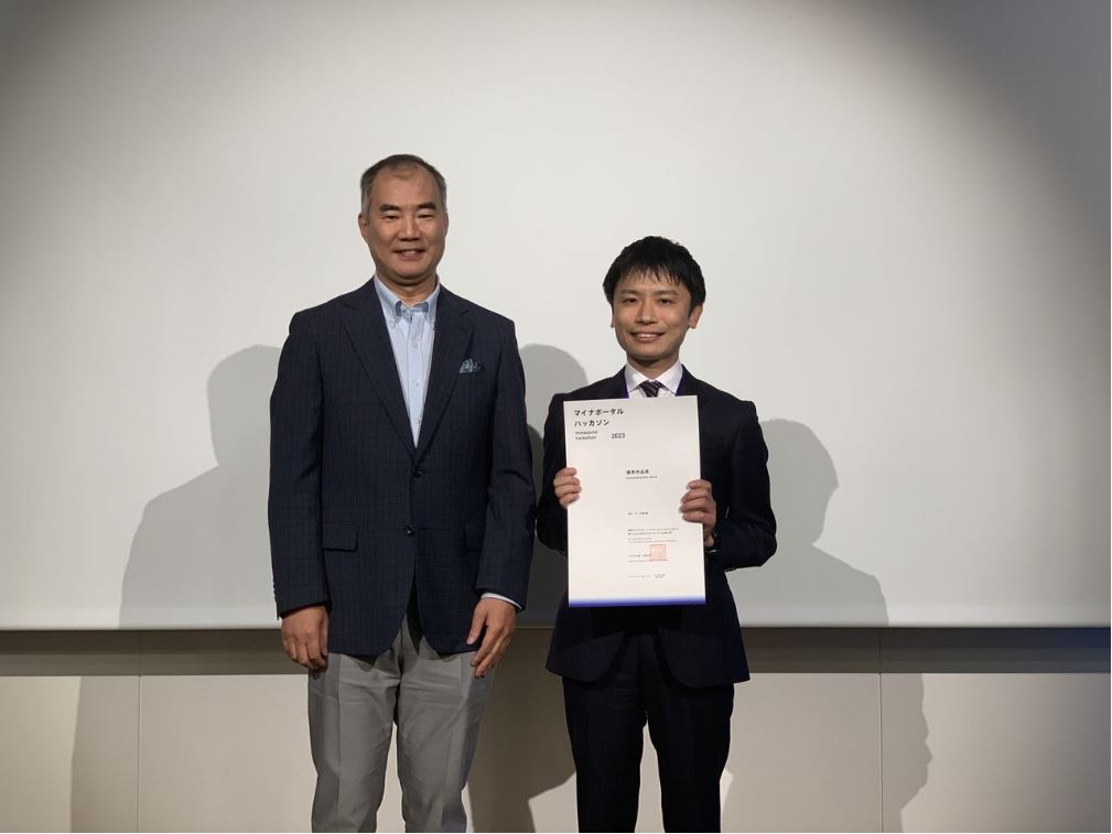 特別審査委員野口氏とぽん・で・大地チームの記念写真