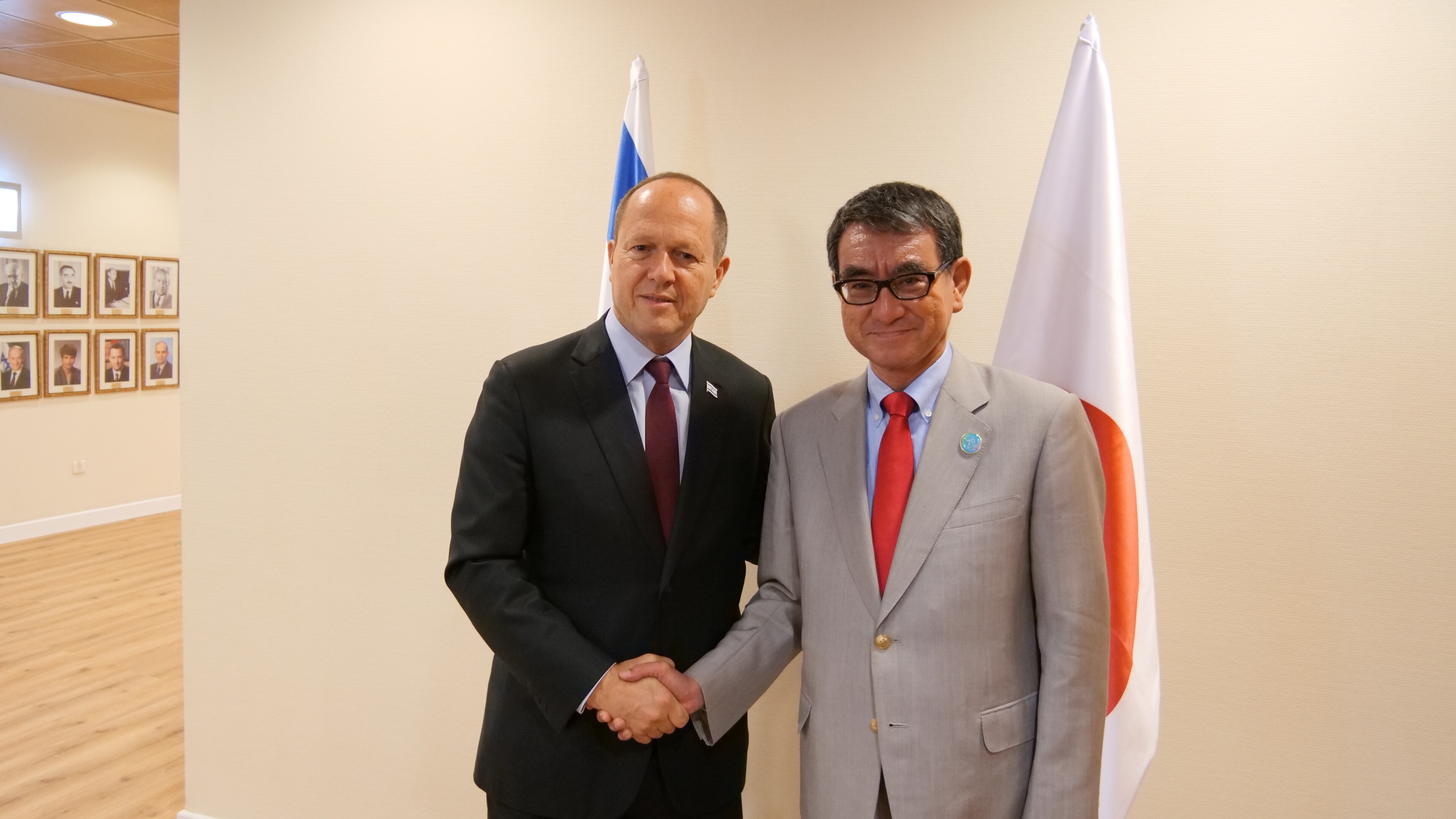 Minister Kono (right) shaking hand with Minister Barkat (left).