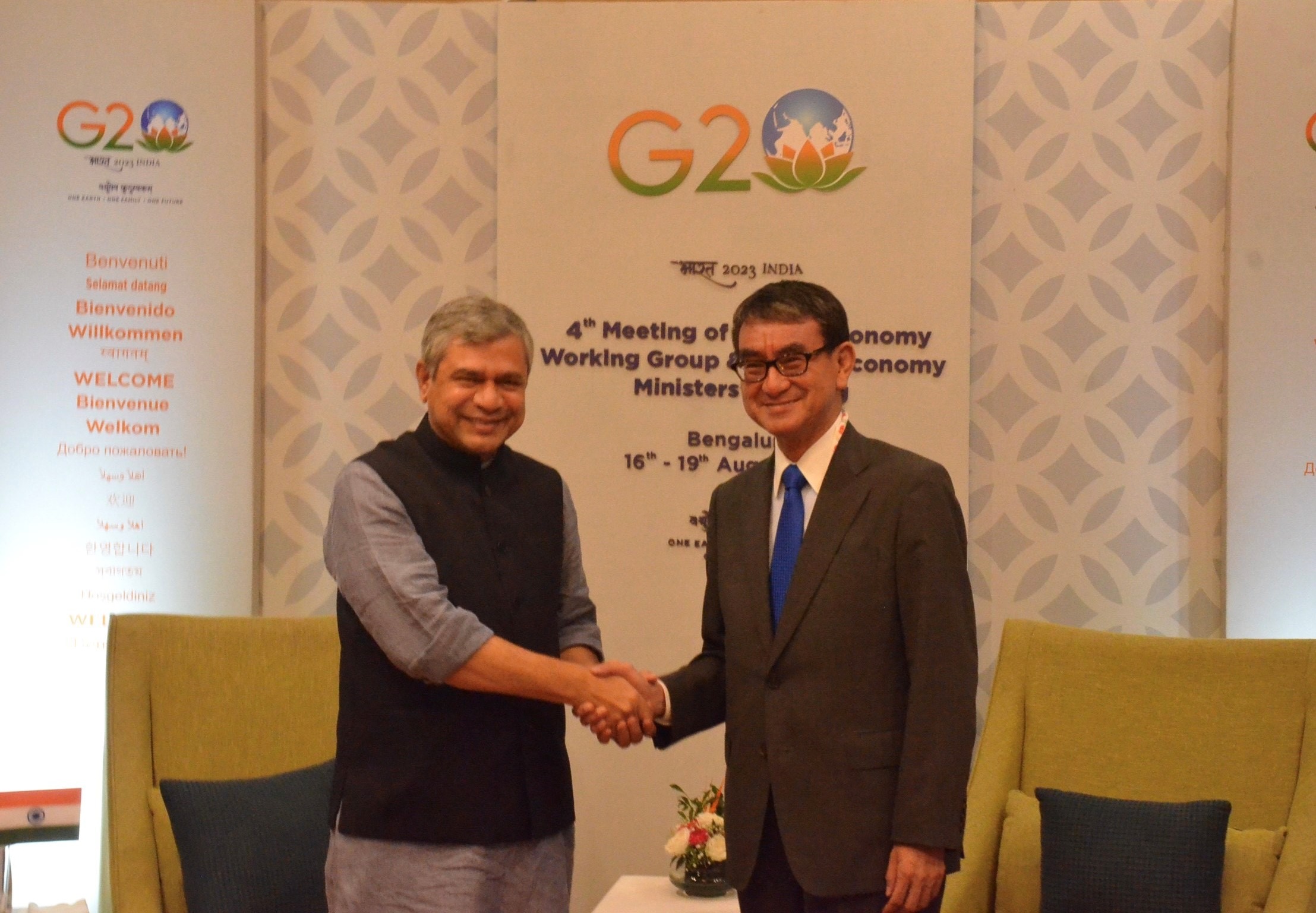 Photo of Minister Vaishnau of India (left) and Minister Kono (right) shaking hands.