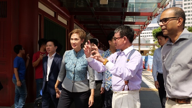 Minister Kono walks around the temple where the meeting was held. From left to right: Minister Teo, Minister Kono, and Minister Puthucheary.